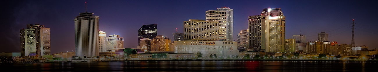 Downtown New Orleans, Louisiana and the Mississippi River at twilight